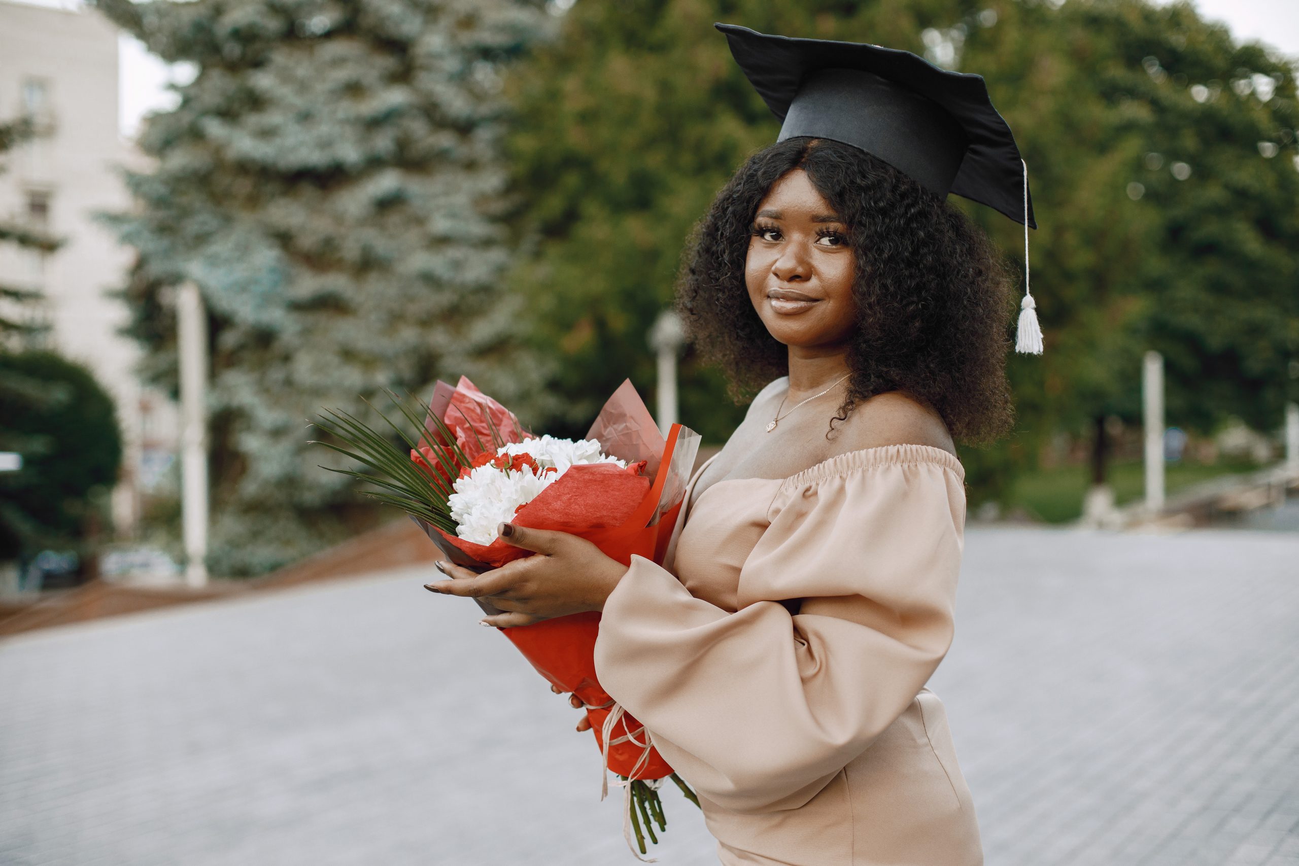 Excited african american woman at her graduation. Excited african american woman at her graduation.
