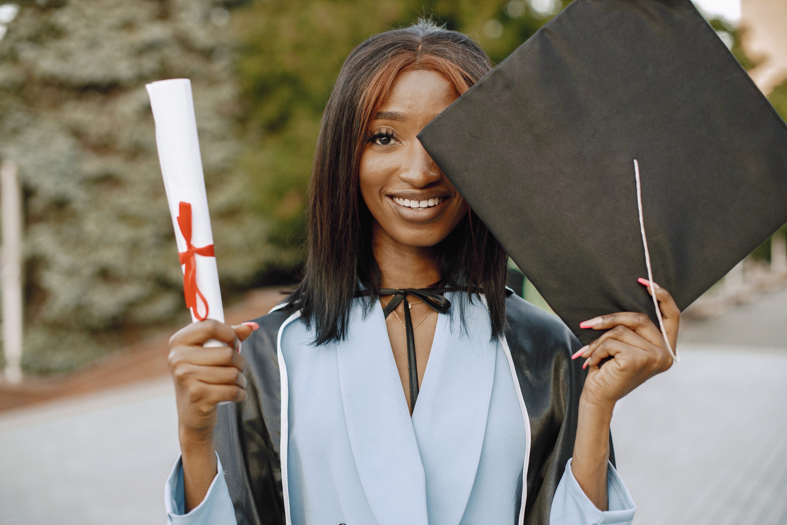 Excited african american woman at her graduation. Excited african american woman at her graduation.